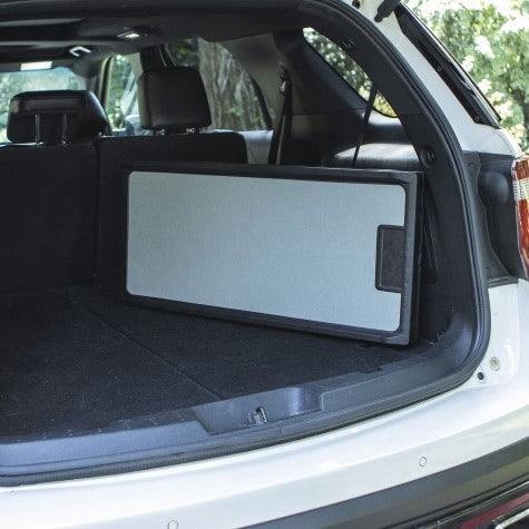 Car dog ramp folded inside car trunk