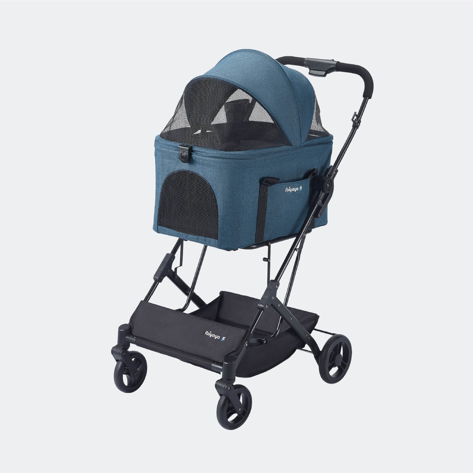 A stroller pet carrier travel system by Baby Jogger, featuring a blue fabric stroller with a mesh canopy and a black base basket, shown on a light gray background.