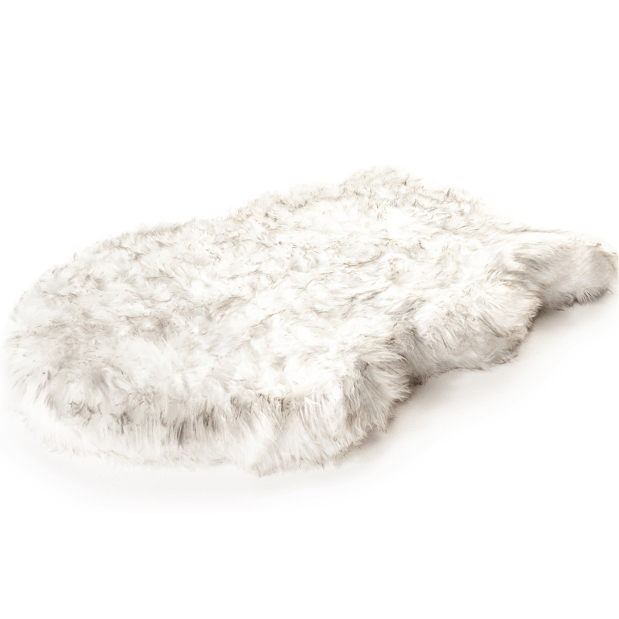 White fluffy rug on a white background