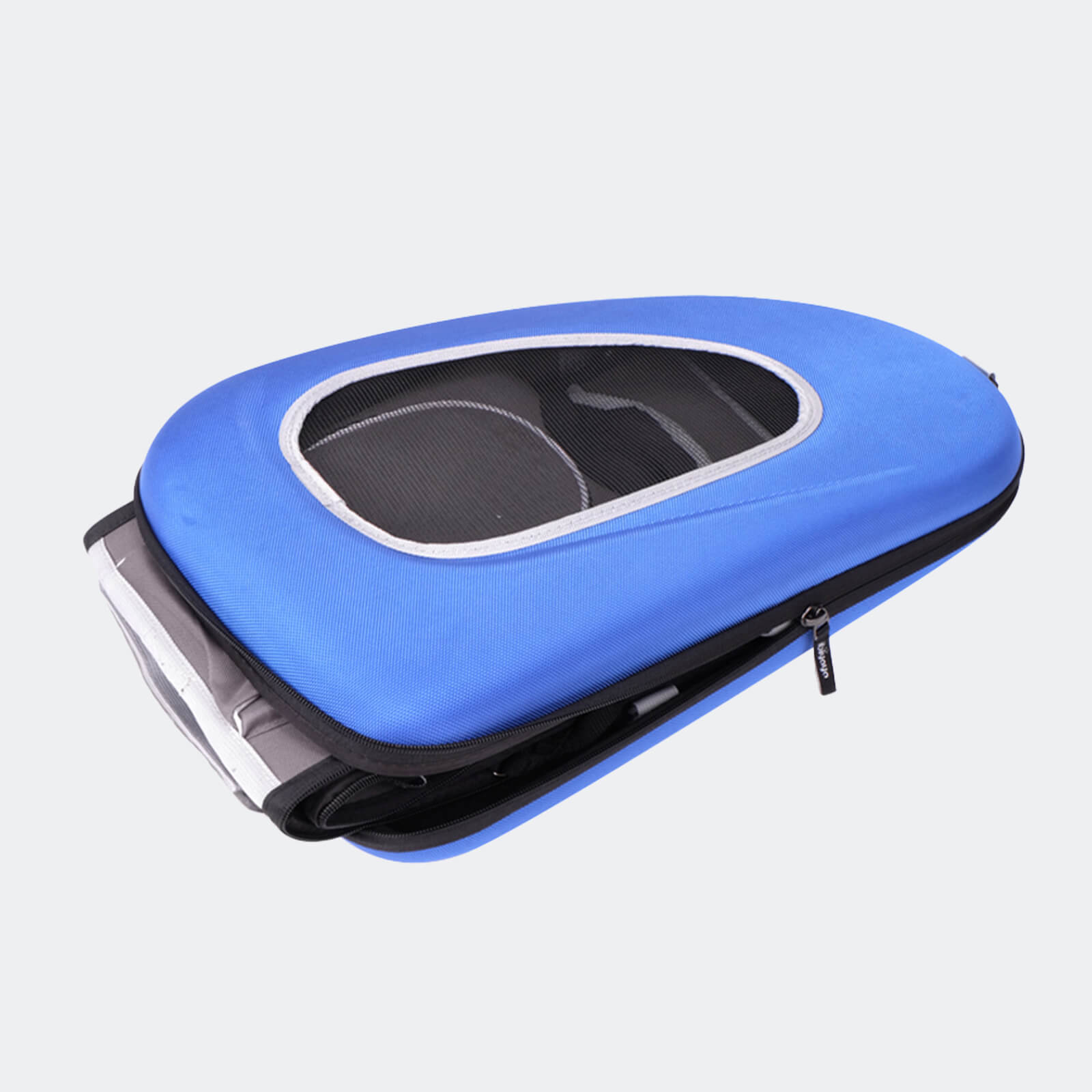 Blue and black pet carrier on a light gray background