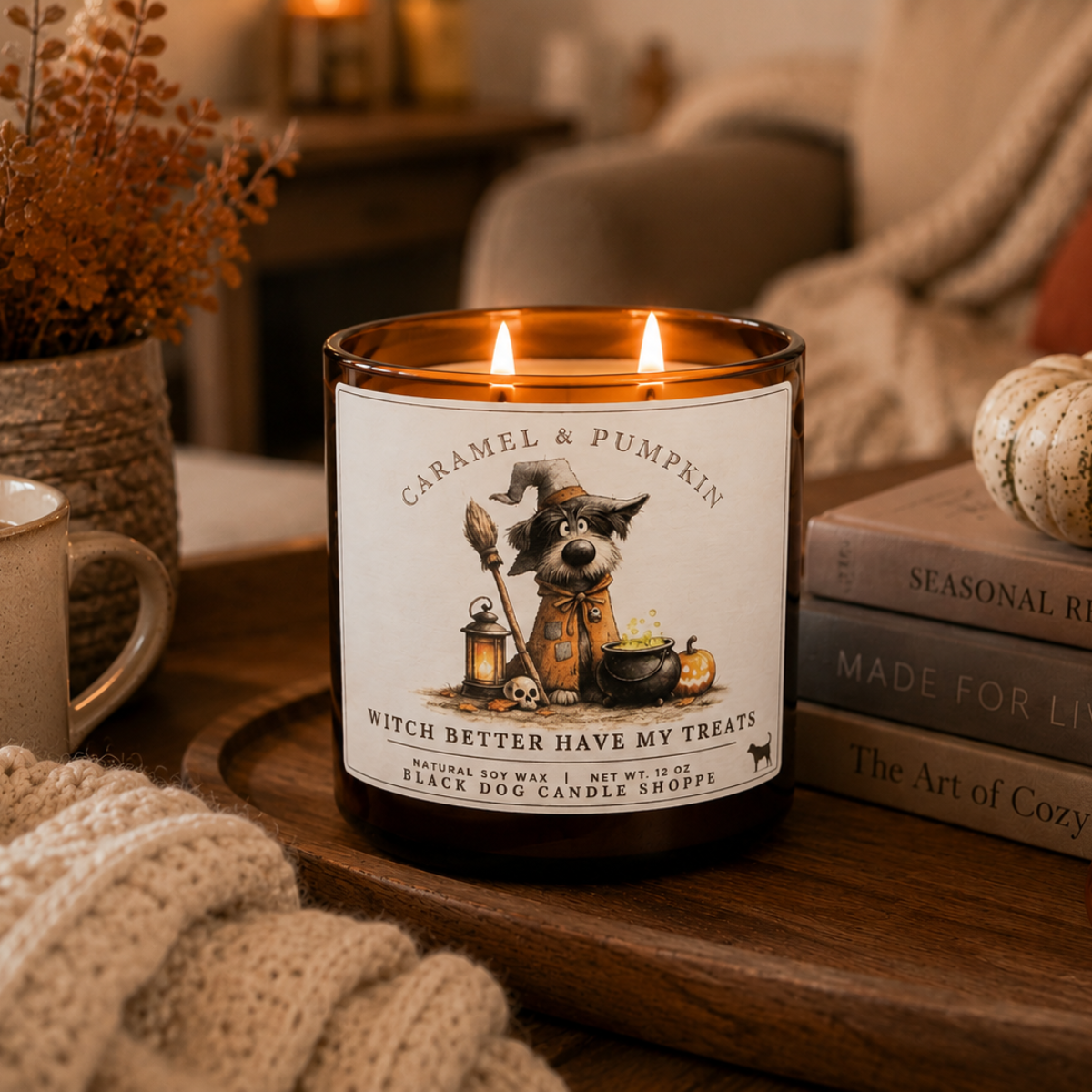 Candle labeled 'Caramel & Pumpkin Witch Better Have My Treats' on a wooden surface with a cozy background.