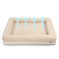 Beige pet bed with blue arrows indicating air circulation on a white background