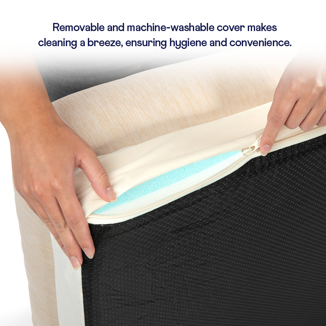 Person opening a mattress cover to reveal a black mattress base.