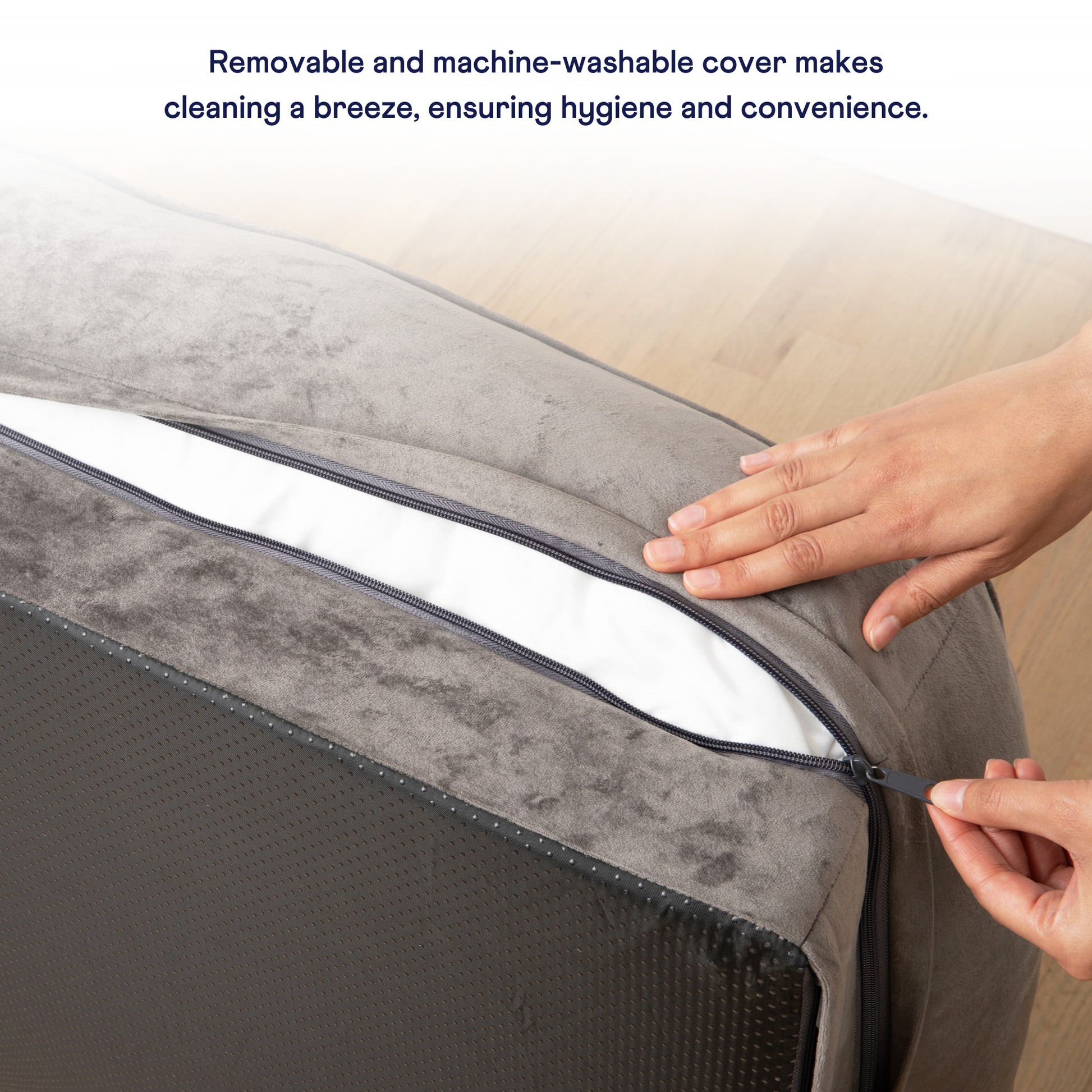 Person zipping up a gray mattress cover with text about its hygienic and convenient features.
