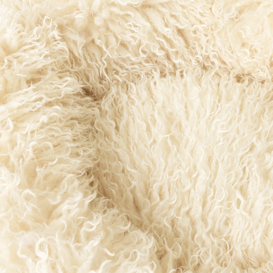 Close-up of beige, fluffy fabric texture